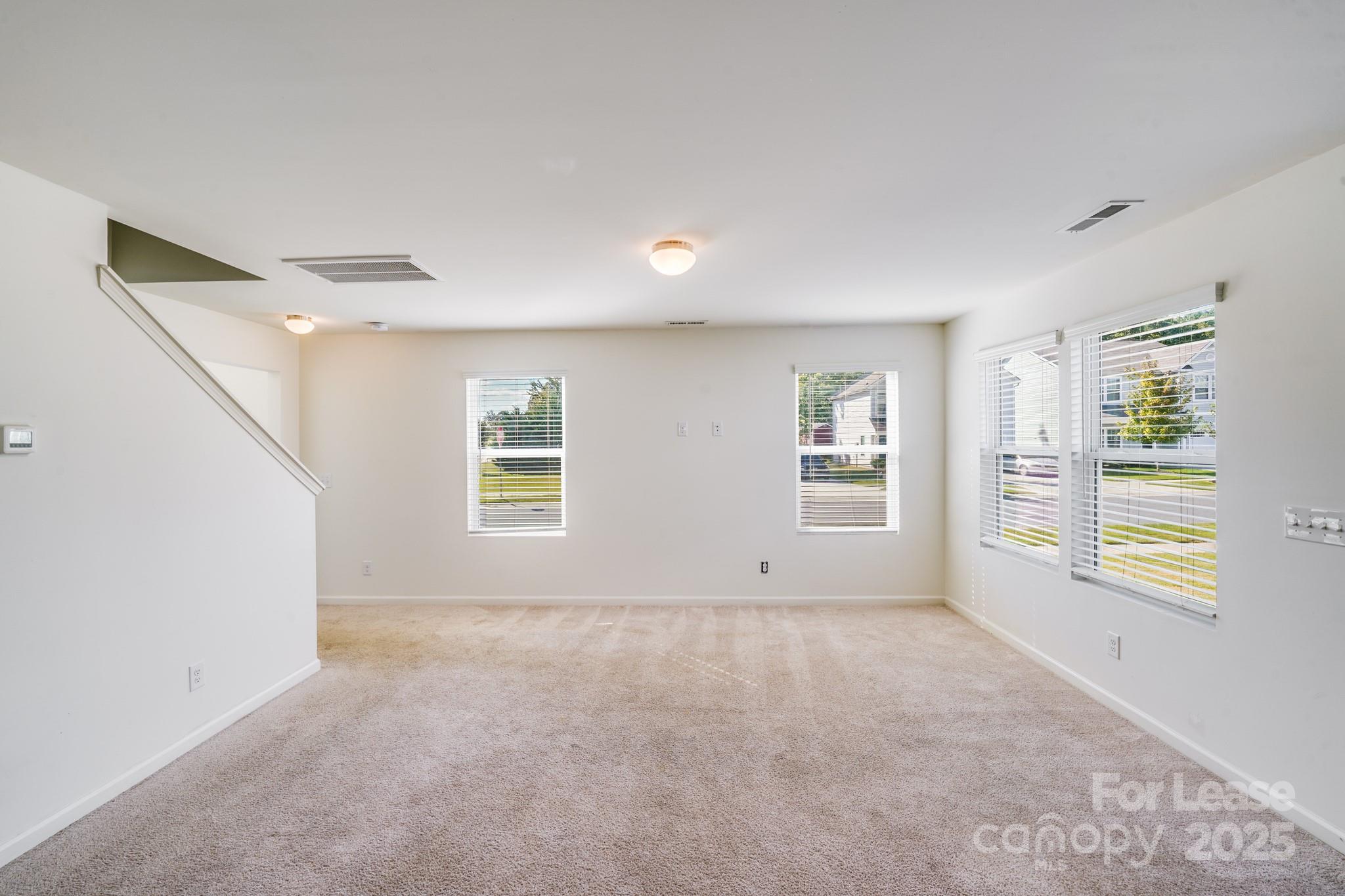 12915 Hill Pine Road Midland, NC 28107 - Photo 3 of 31 a view of an empty room with a window