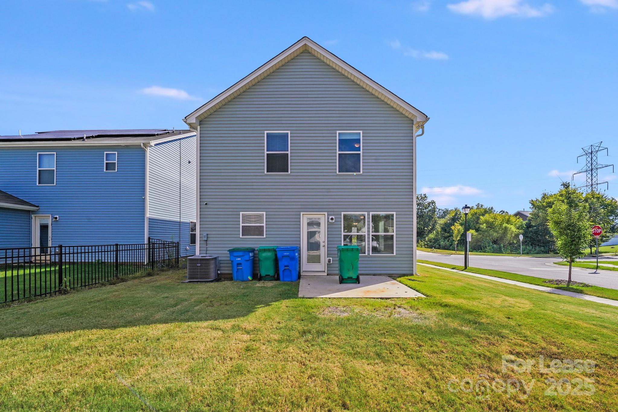12915 Hill Pine Road Midland, NC 28107 - Photo 31 of 31 a view of an house with backyard and road
