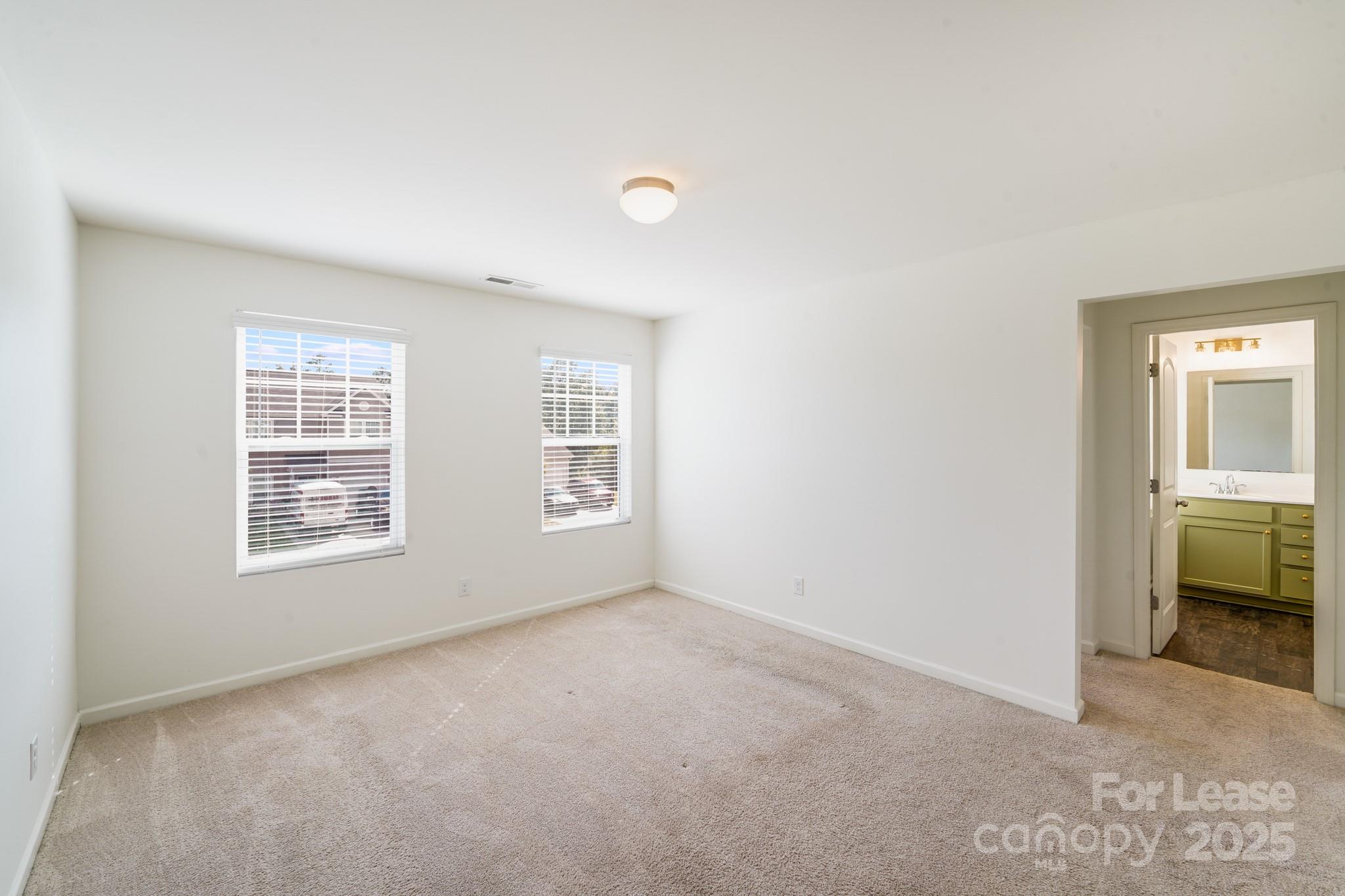 12915 Hill Pine Road Midland, NC 28107 - Photo 6 of 31 a view of an empty room with a window