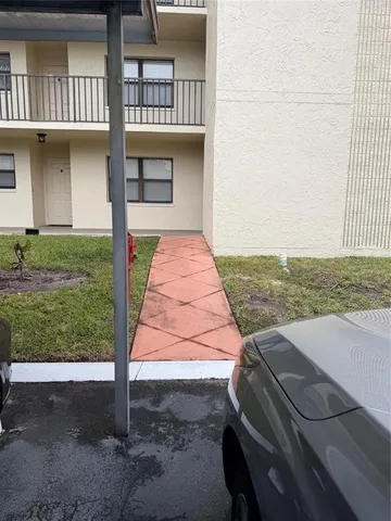 a view of a backyard with a lake view