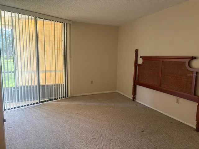 a view of a room with a large window