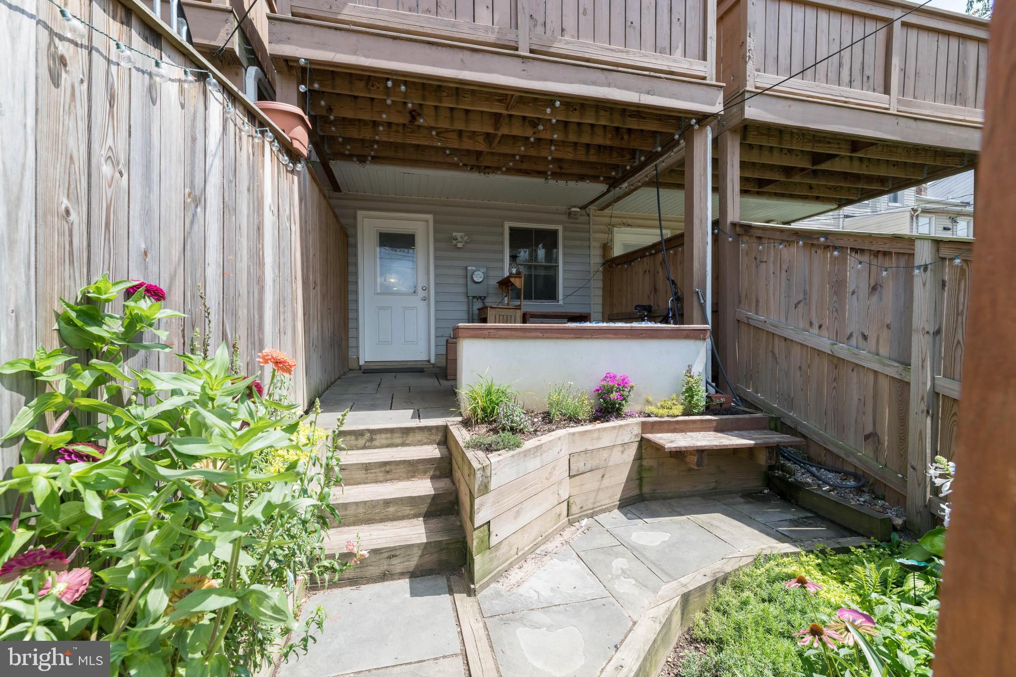 3860 Quarry Avenue Baltimore, MD 21211 - Photo 22 of 31 Terraced Garden with Built-In Gas Fire Pit