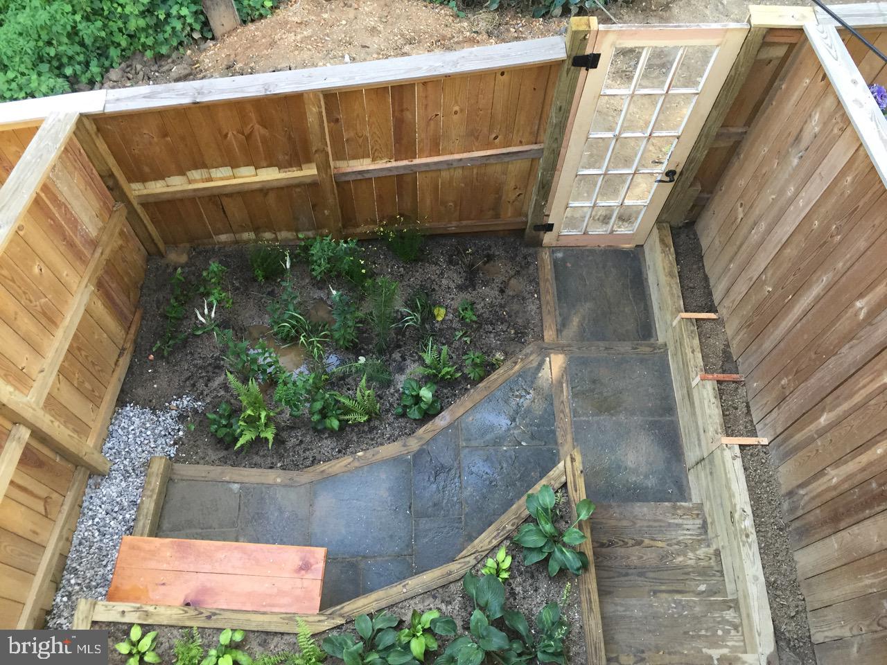 3860 Quarry Avenue Baltimore, MD 21211 - Photo 24 of 31 Gorgeous backyard landscaping and hardscaping