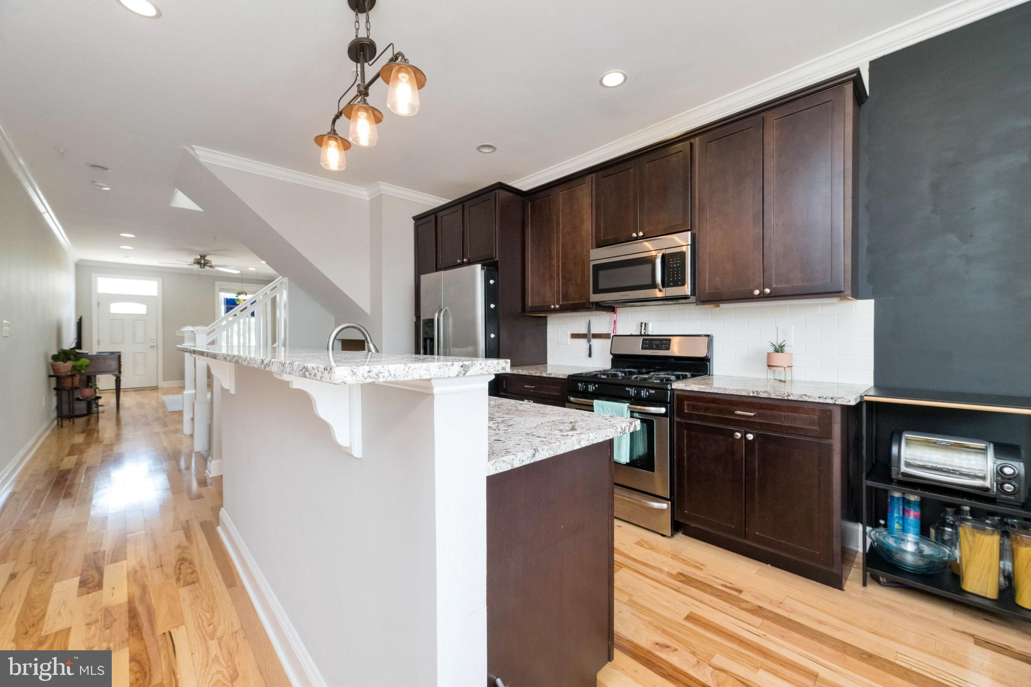3860 Quarry Avenue Baltimore, MD 21211 - Photo 7 of 31 Dark finish custom cabinets