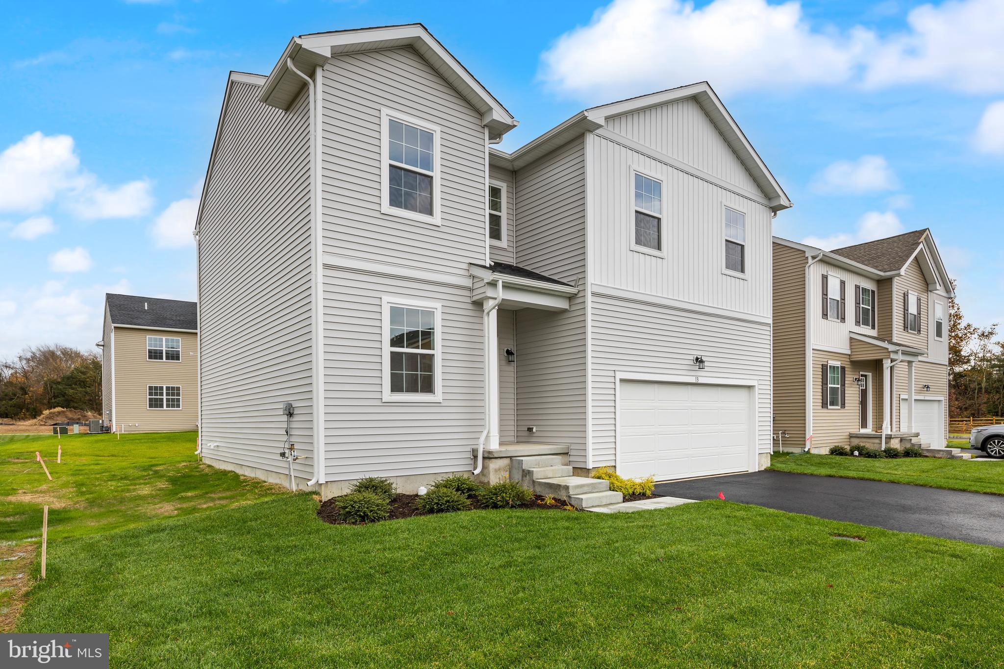 13 Inkwell Lane Sicklerville, NJ 08081 - Photo 2 of 37 a front view of a house with a yard
