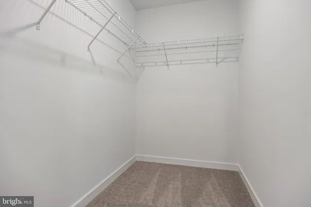 a view of a room with racks on the wall