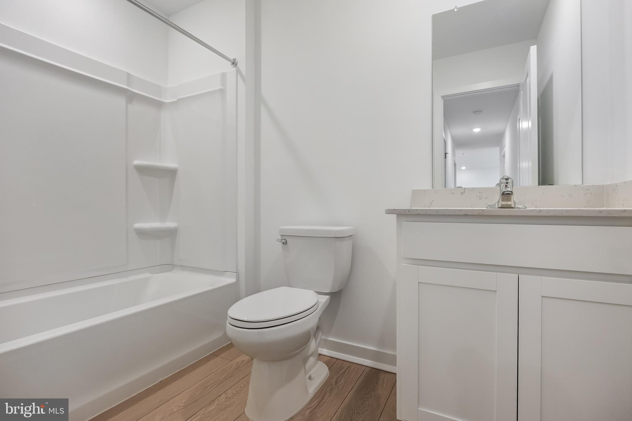 13 Inkwell Lane Sicklerville, NJ 08081 - Photo 26 of 37 a bathroom with a sink a toilet and shower