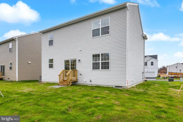 a view of a backyard with flat area