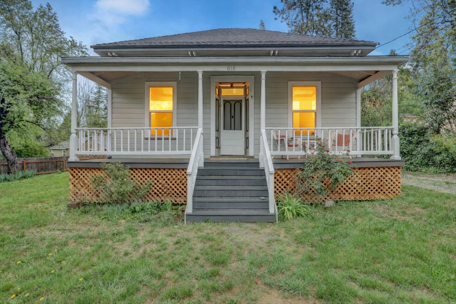 front view of a house with a yard