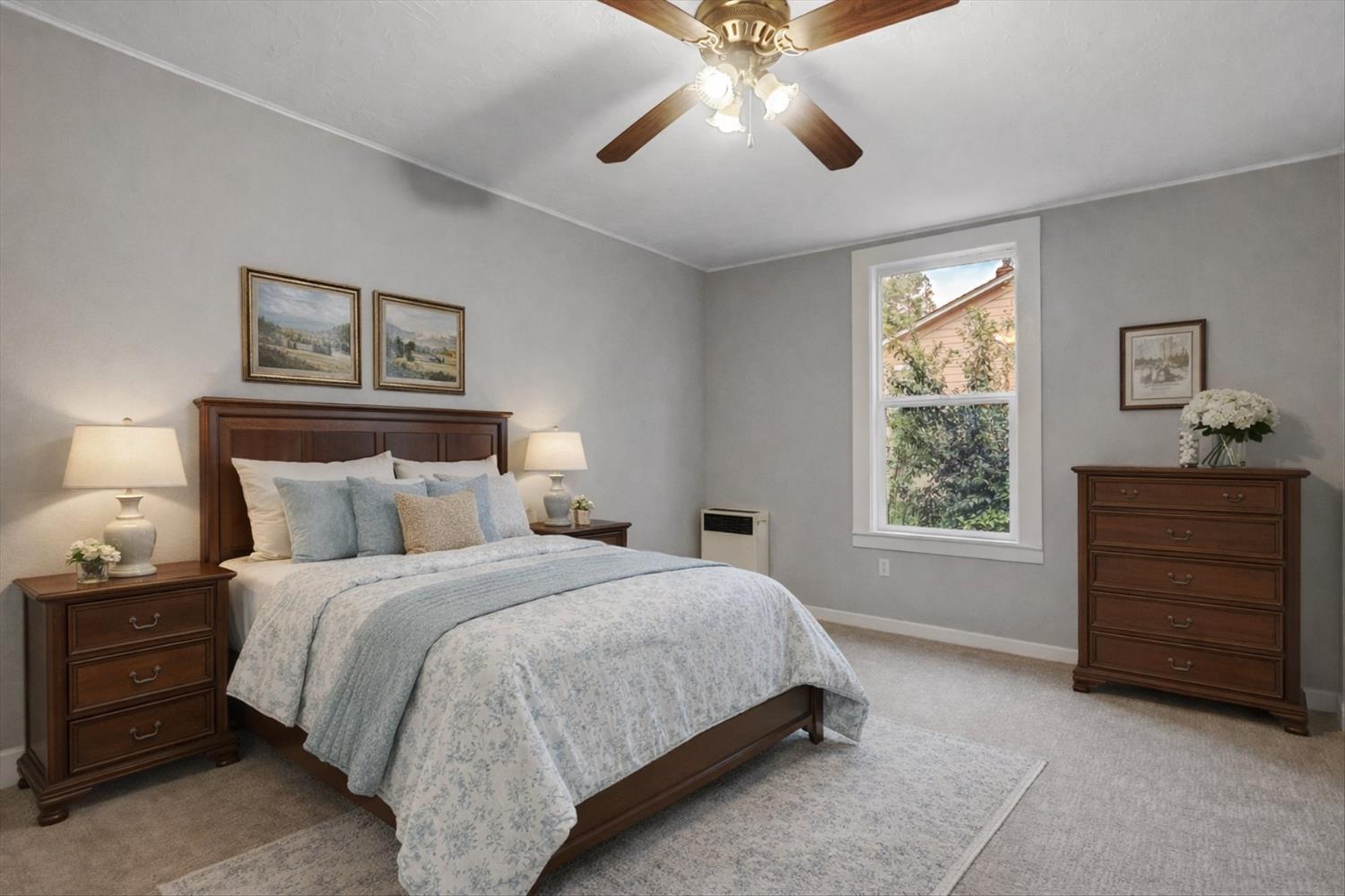 618 Walsh Street Grass Valley, CA 95945 - Photo 13 of 32 a bedroom with a bed a dresser and a window