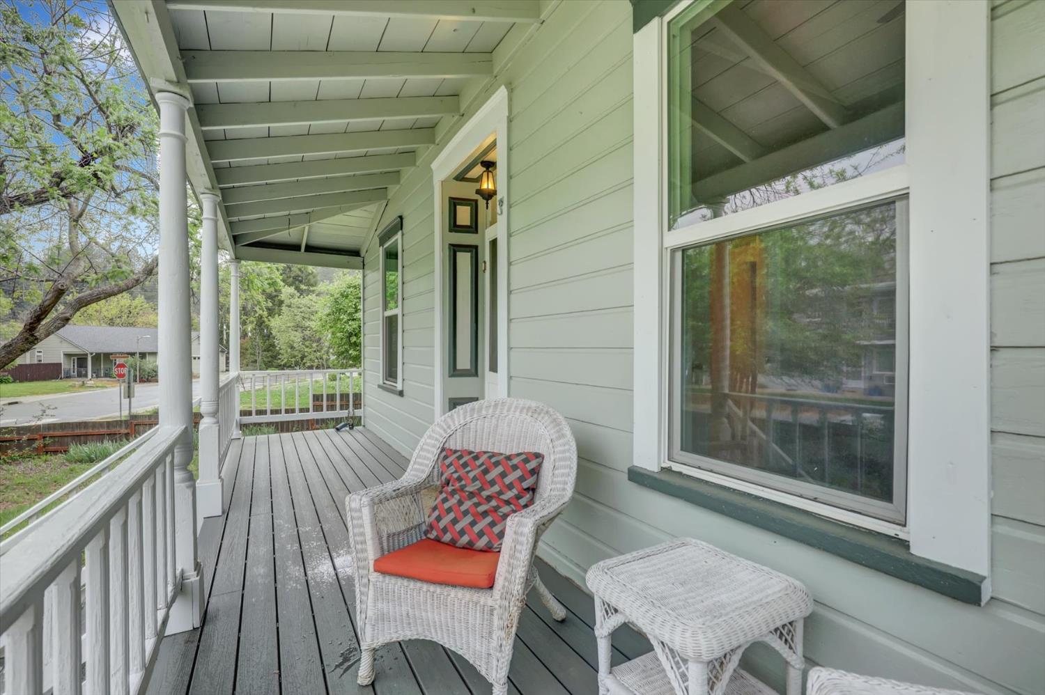 618 Walsh Street Grass Valley, CA 95945 - Photo 23 of 32 a balcony with furniture and wooden floor