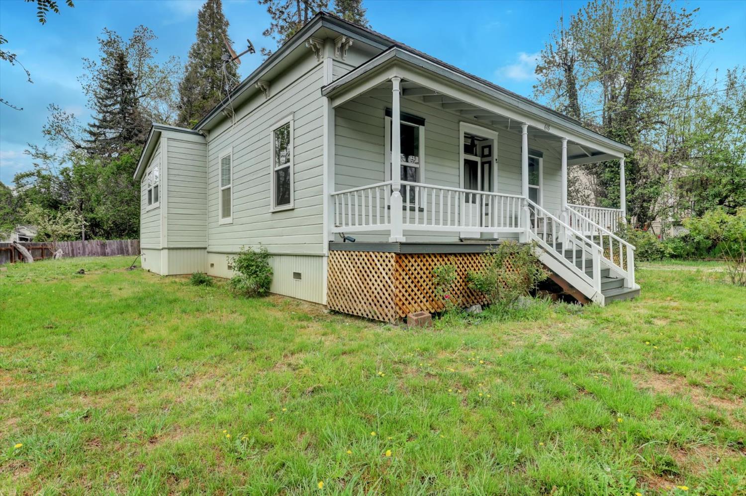 618 Walsh Street Grass Valley, CA 95945 - Photo 25 of 32 a view of a house with a yard