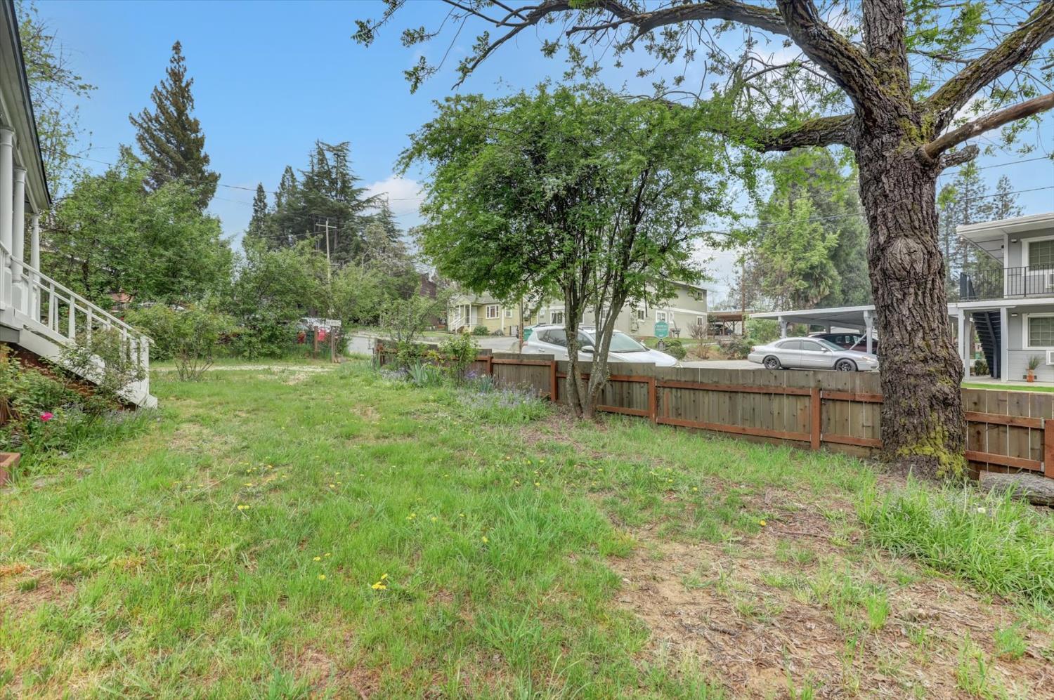 618 Walsh Street Grass Valley, CA 95945 - Photo 31 of 32 a backyard of a house with lots of green space