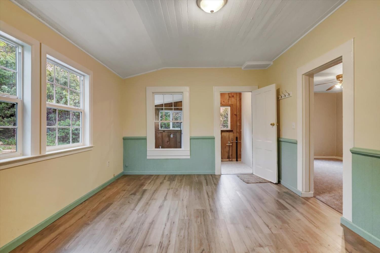 618 Walsh Street Grass Valley, CA 95945 - Photo 5 of 32 wooden floor in an empty room with a window