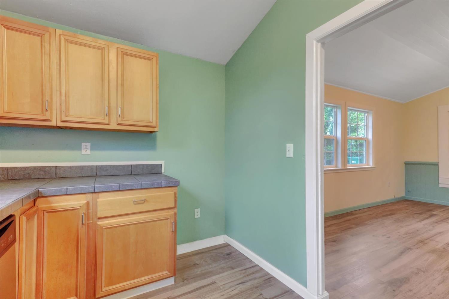 618 Walsh Street Grass Valley, CA 95945 - Photo 10 of 32 a view of kitchen with wooden floor and cabinets