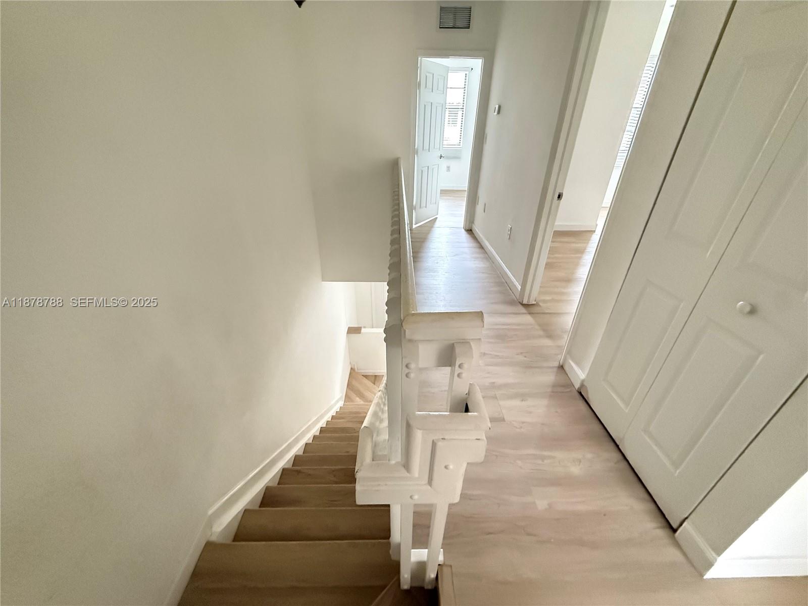 3204 Southeast 5th Court Homestead, FL 33033 - Photo 15 of 25 a view of entryway and hall with wooden floor