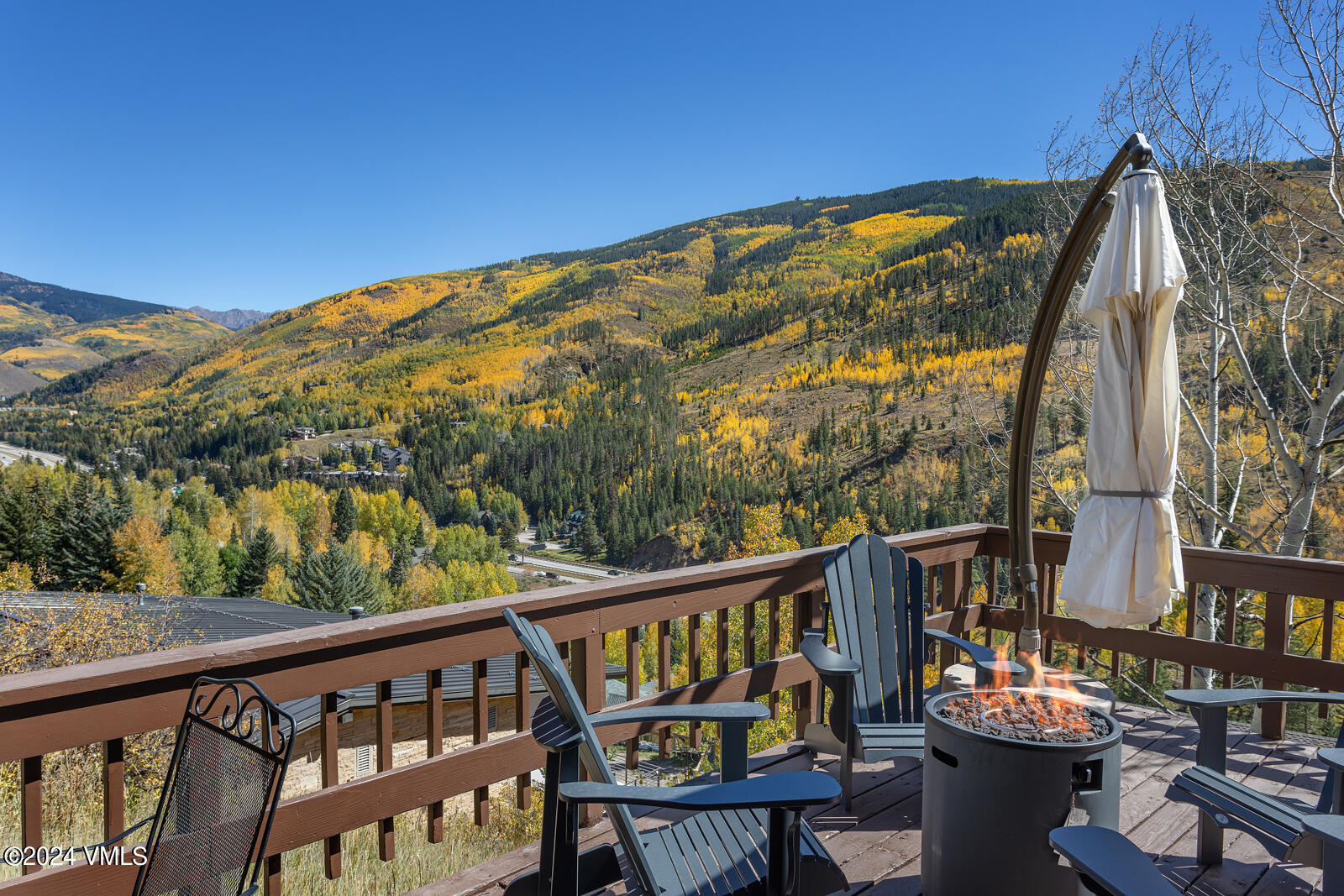 2701 Davos Trail Vail, CO 81657 - Photo 17 of 29 a view of a chairs and table in patio