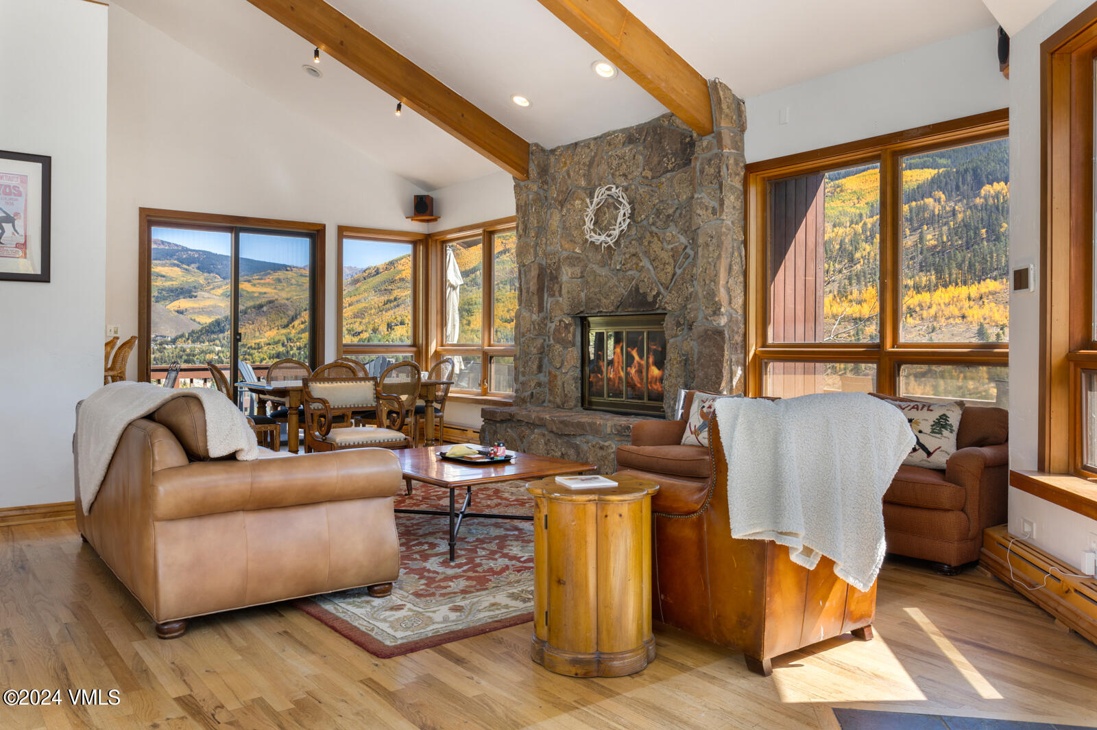 2701 Davos Trail Vail, CO 81657 - Photo 18 of 29 a living room with fireplace furniture and a large window