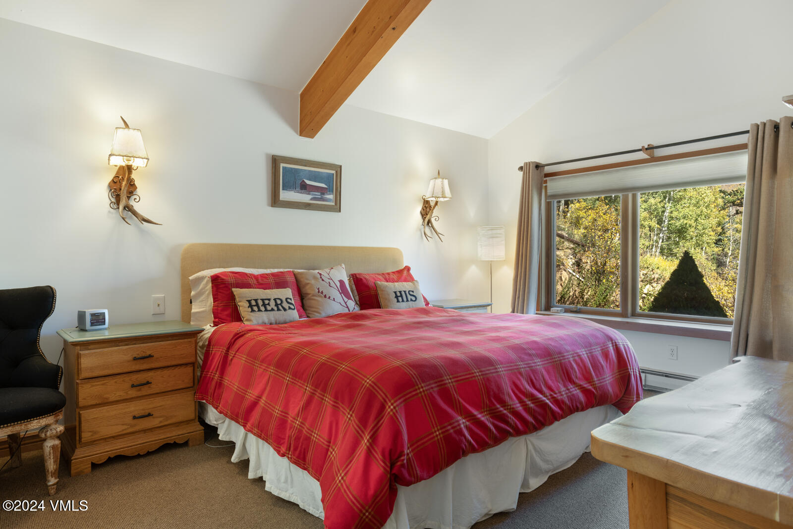 2701 Davos Trail Vail, CO 81657 - Photo 22 of 29 a bedroom with bed and window