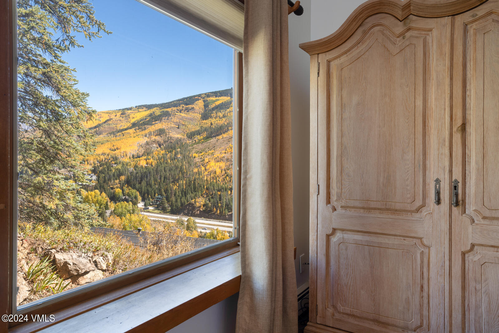 2701 Davos Trail Vail, CO 81657 - Photo 25 of 29 a view of a glass door with a yard from a window
