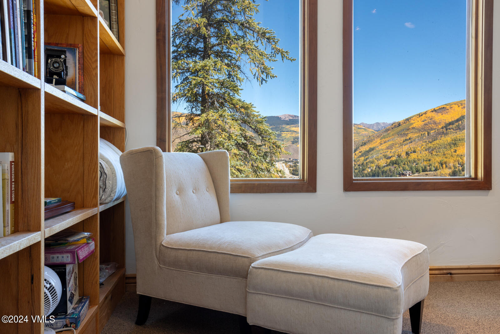 2701 Davos Trail Vail, CO 81657 - Photo 26 of 29 a living room with furniture and a window
