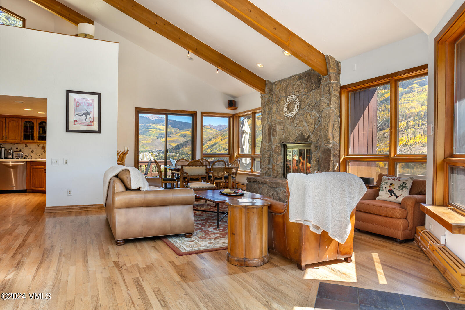 2701 Davos Trail Vail, CO 81657 - Photo 8 of 29 a living room with fireplace furniture and a large window