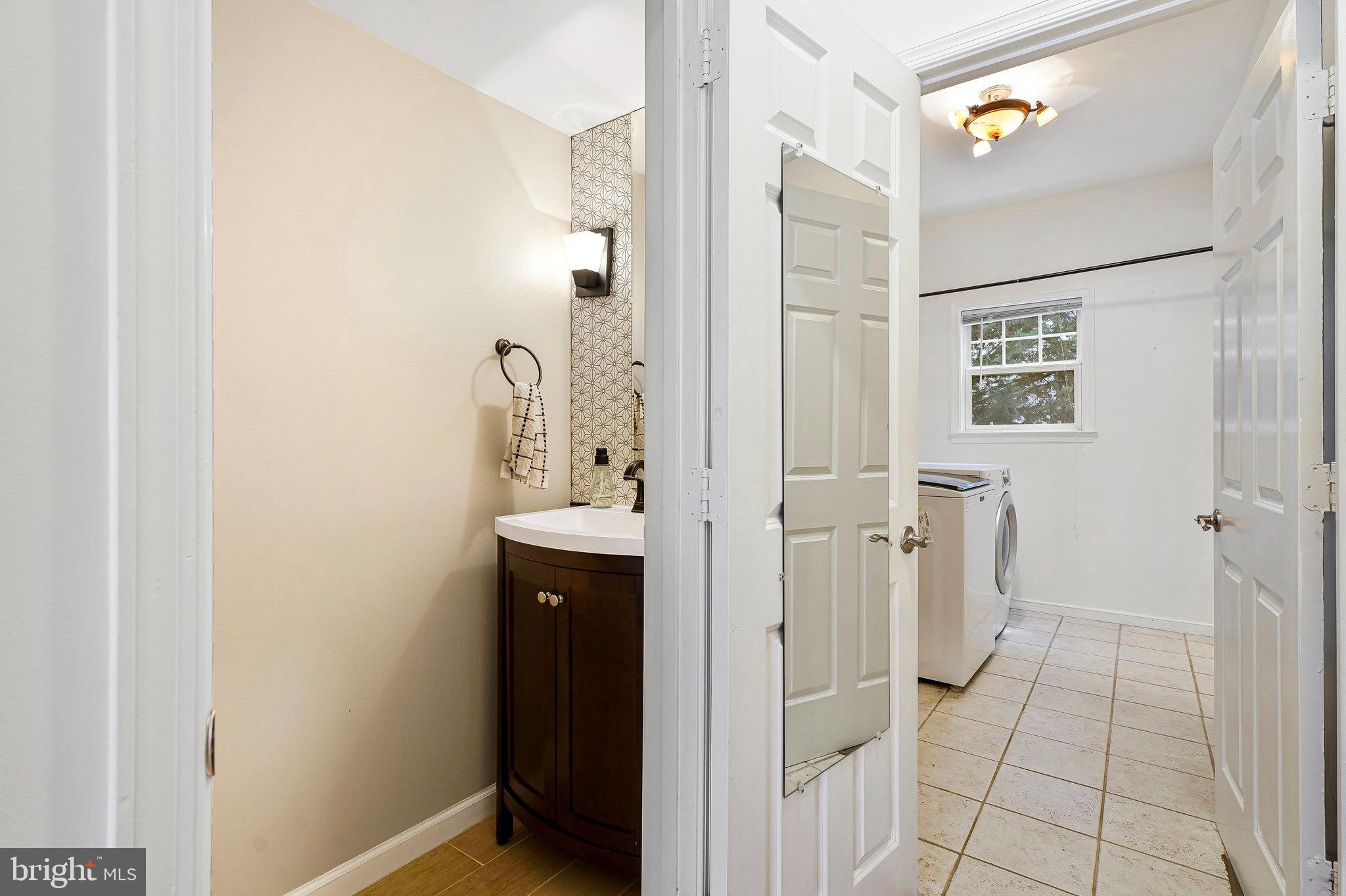 26222 Ocala Circle Chantilly, VA 20152 - Photo 26 of 74 Half Bath With Custom Tile and Custom Vanity