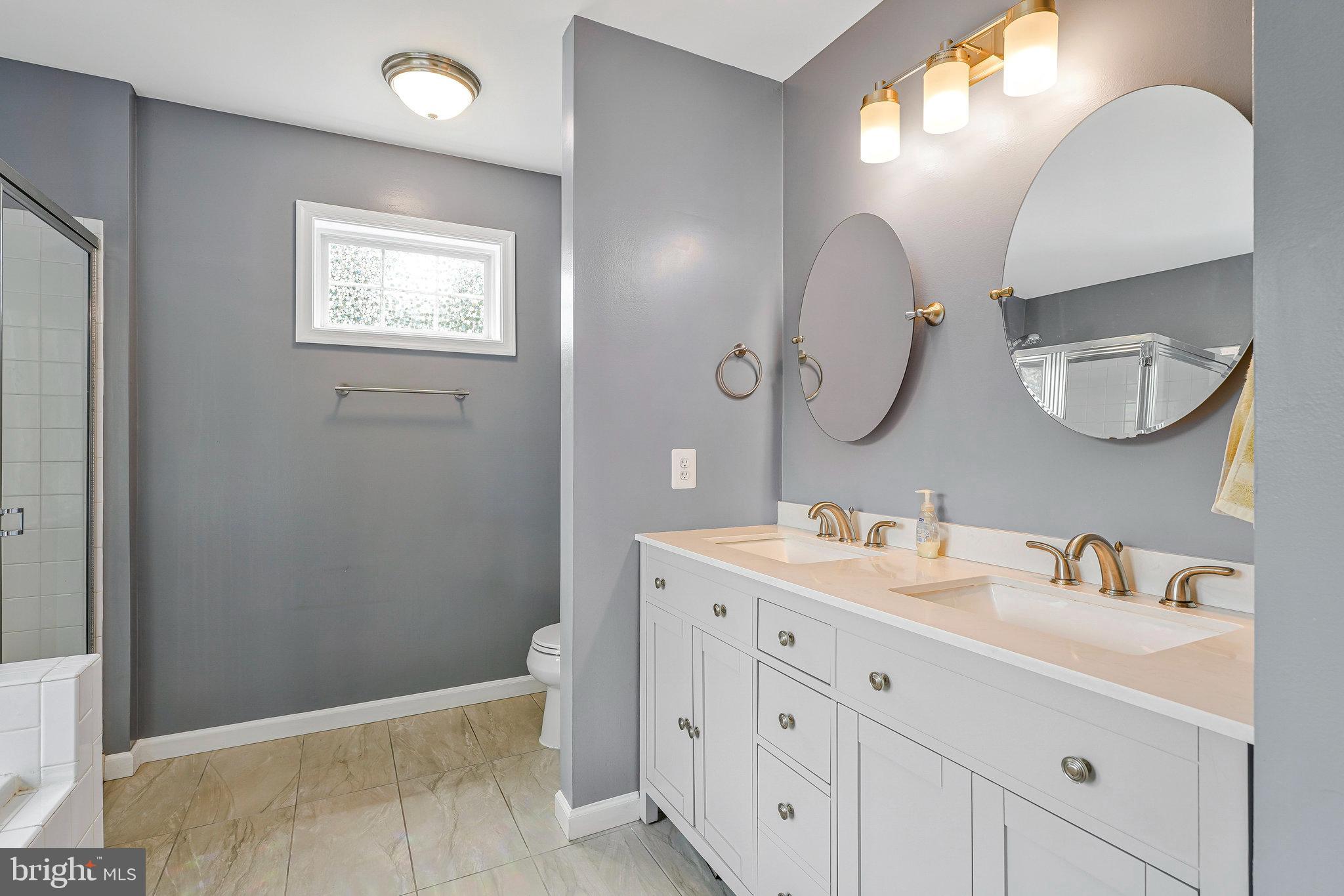 26222 Ocala Circle Chantilly, VA 20152 - Photo 34 of 74 Primary Bath With Custom Tile and Dual Vanity