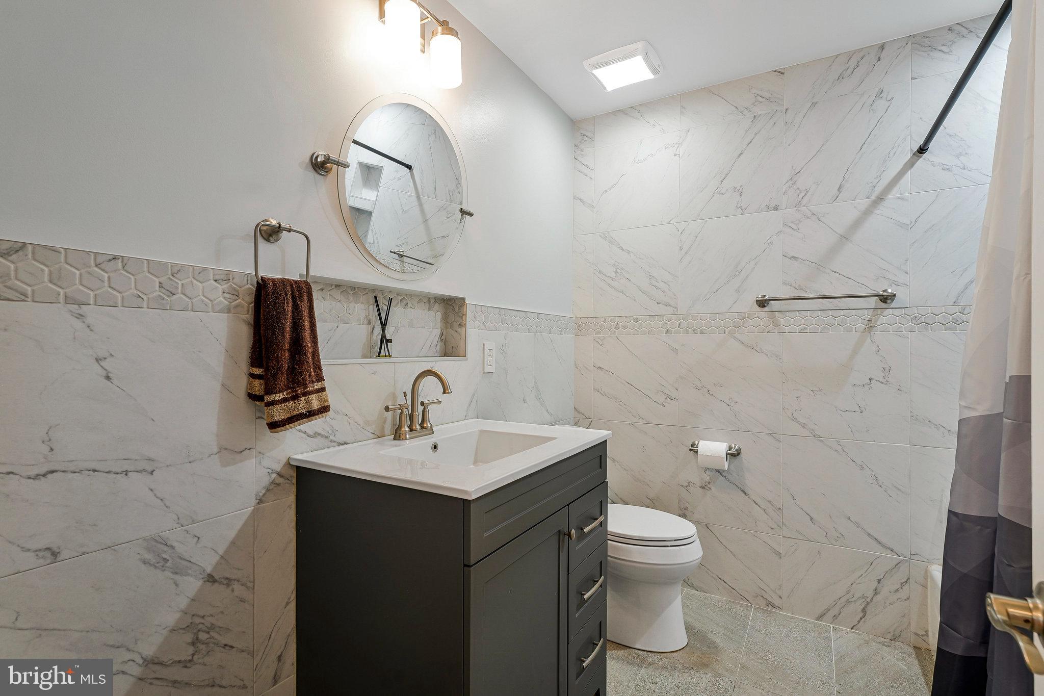 26222 Ocala Circle Chantilly, VA 20152 - Photo 45 of 74 Second Floor Full Bath Custom Tile and Vanity