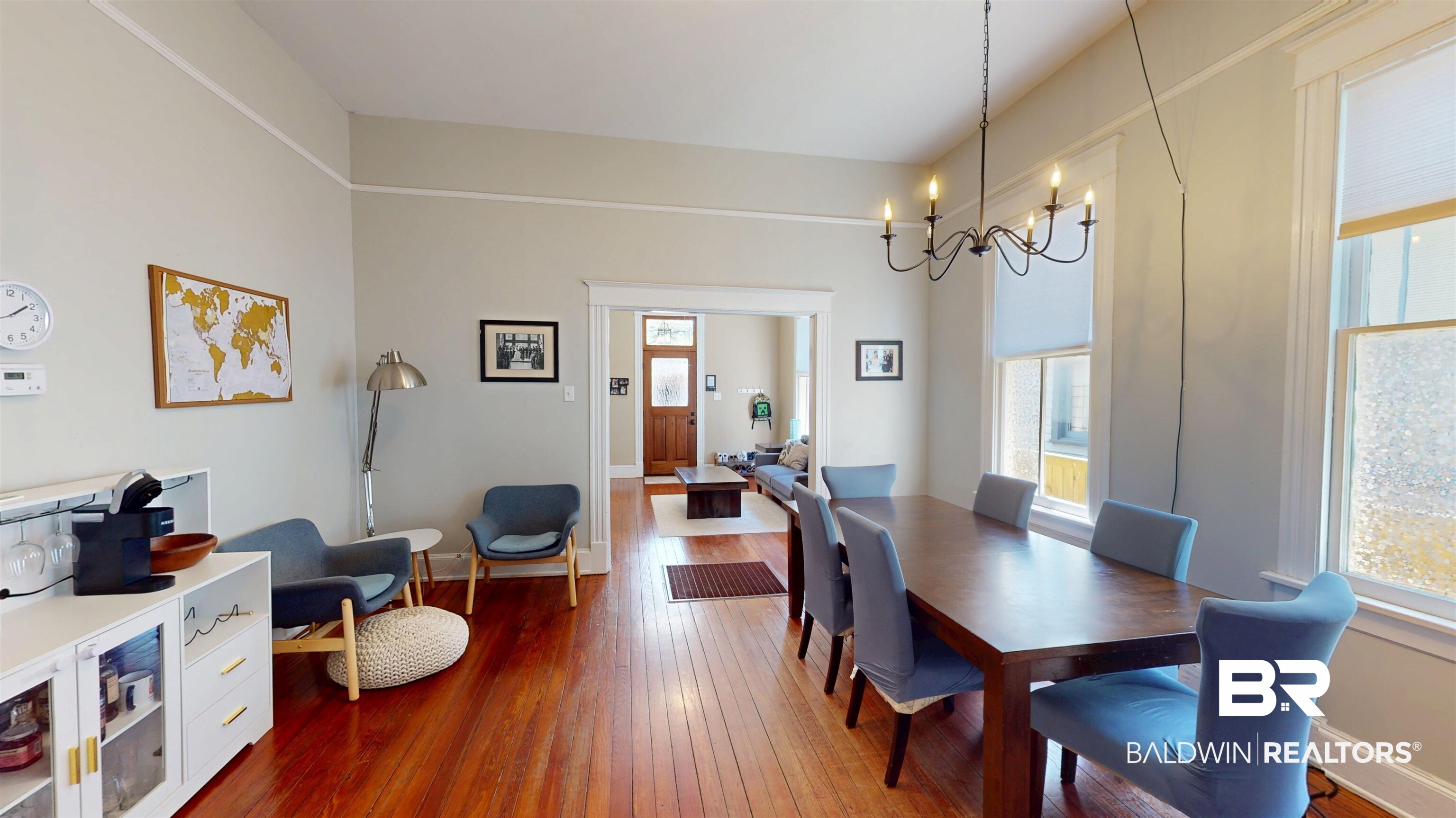 1154 New St Francis Street Mobile, AL 36604 - Photo 21 of 37 Dining area with baseboards, an inviting chandelier, and dark wood-style flooring