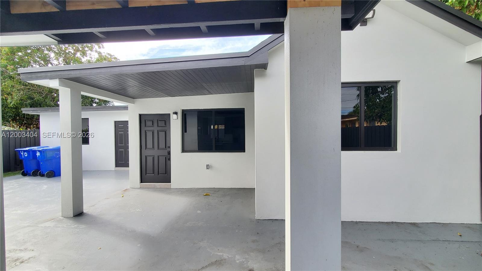40 Southwest 34th Avenue, Unit C Miami, FL 33135 - Photo 2 of 24 a view of an entryway with a livingroom