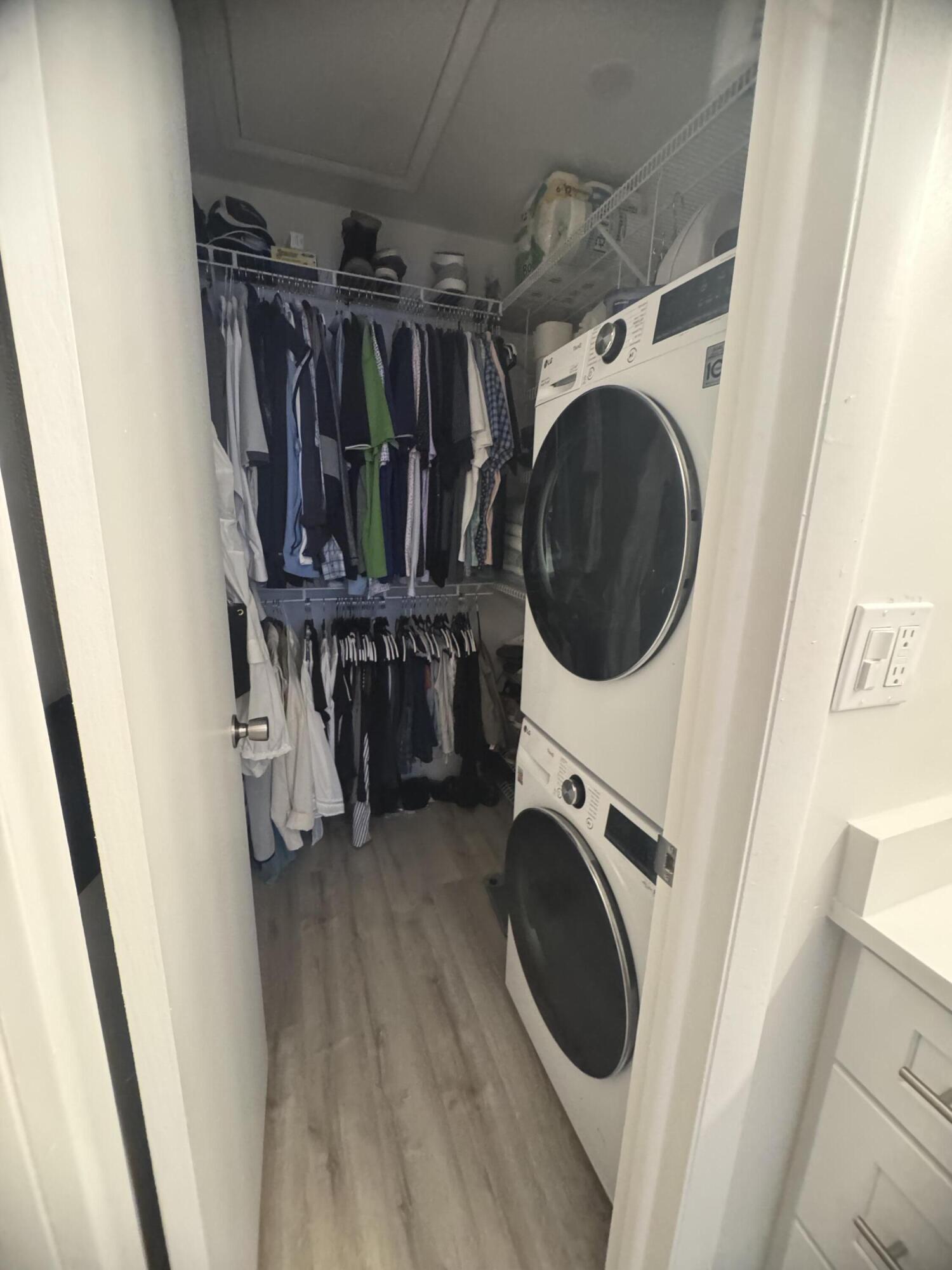 404 High Point Boulevard Delray Beach, FL 33445 - Photo 13 of 18 Primary Closet / Washer and Dryer