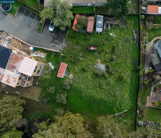an aerial view of a city with lots of residential buildings
