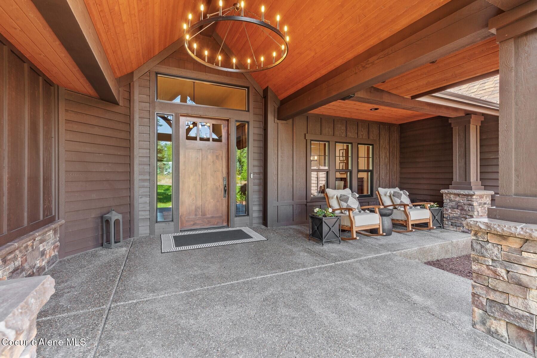 3674 East Basin Falls Road Hayden, ID 83835 - Photo 14 of 70 Covered Porch with Chandelier