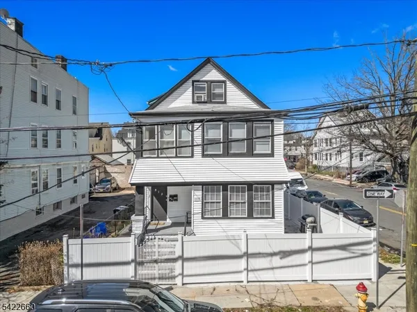 a front view of a house with a porch