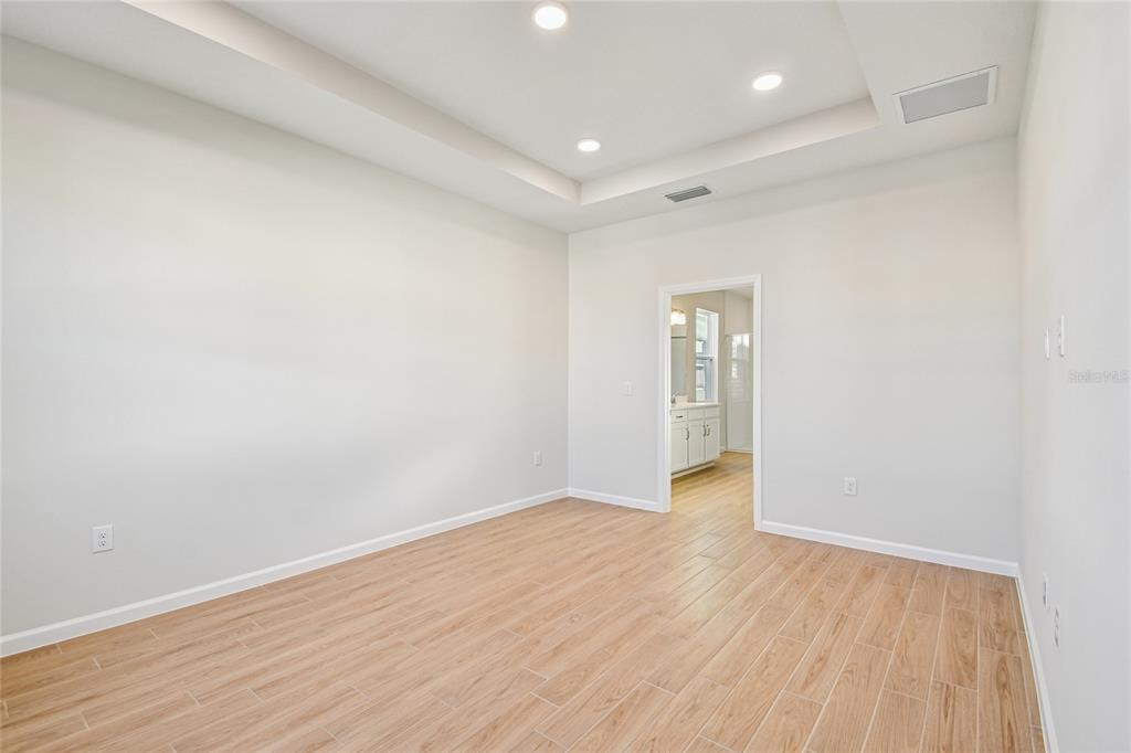 813 River Stone Trail Sanford, FL 32771 - Photo 21 of 33 wooden floor in an empty room