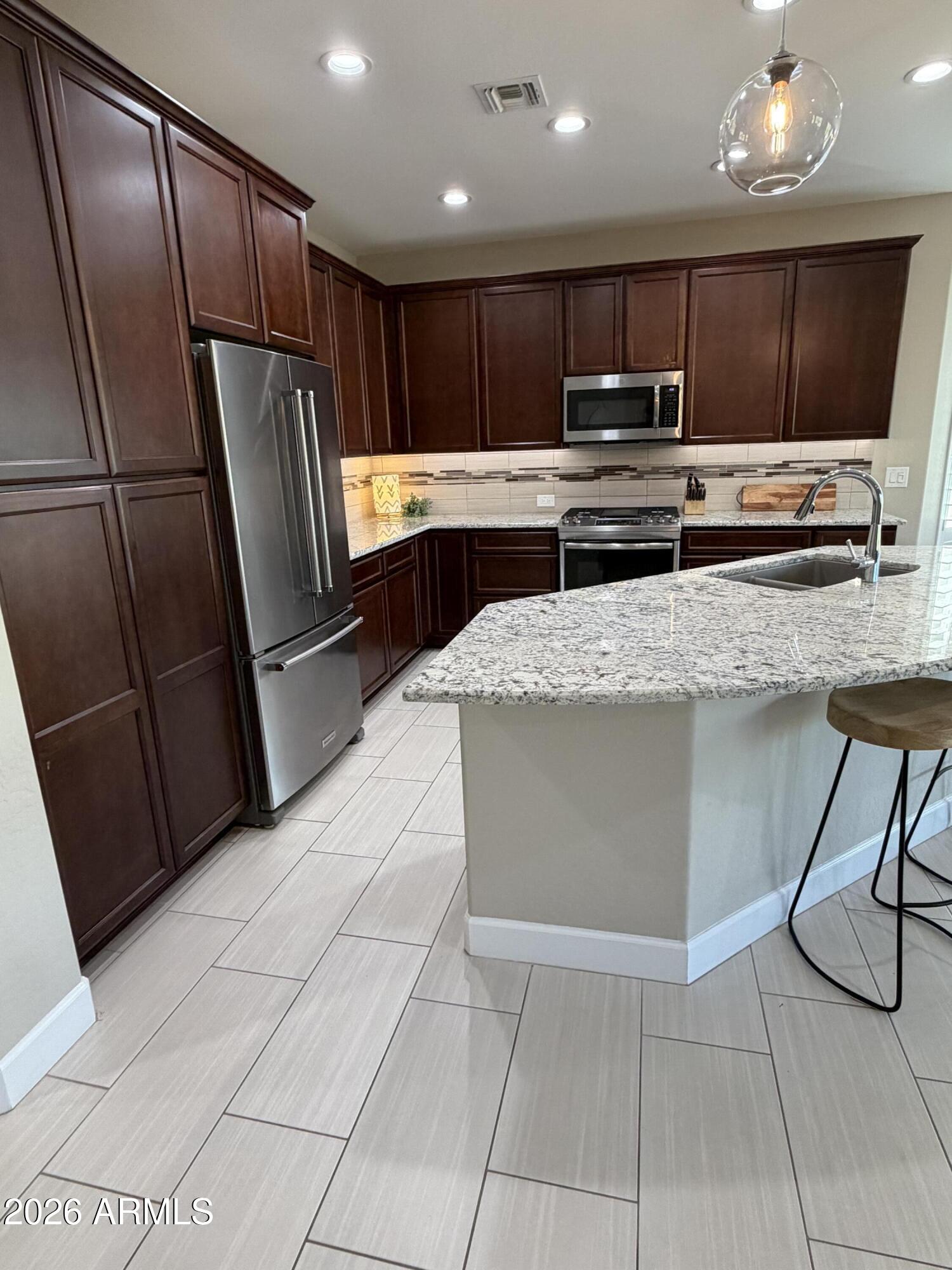 16930 West Almeria Road Goodyear, AZ 85395 - Photo 7 of 40 IMG_2150