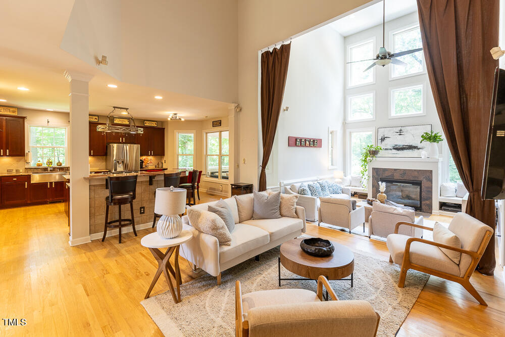 5240 Indigo Moon Way Raleigh, NC 27613 - Photo 13 of 74 a living room with furniture and a large window