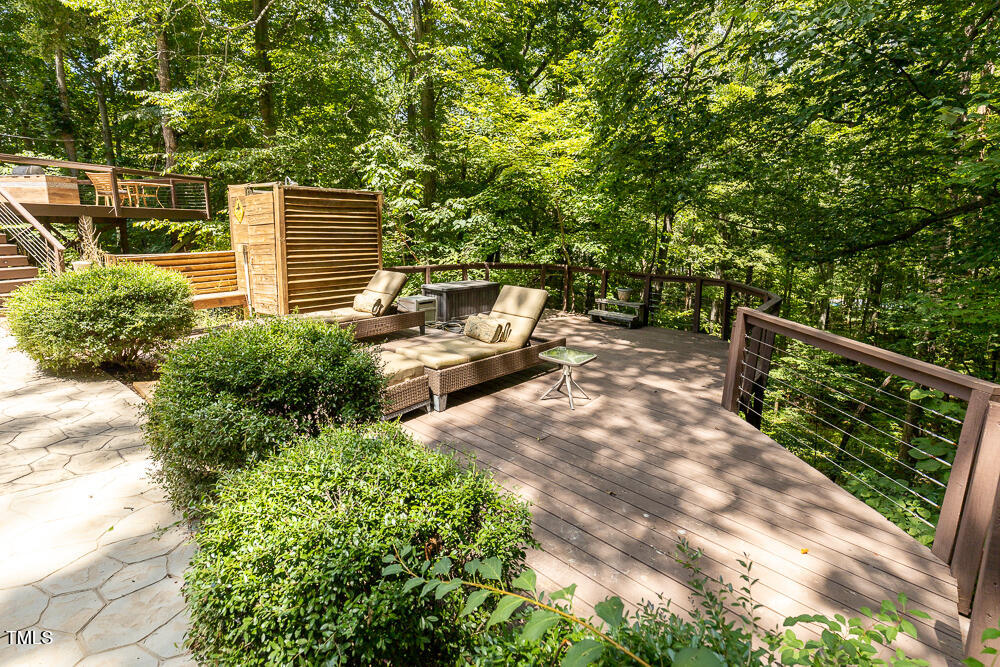 5240 Indigo Moon Way Raleigh, NC 27613 - Photo 66 of 74 a backyard of a house with lots of green space