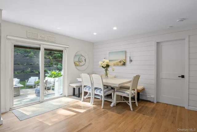 a kitchen with a table and chairs