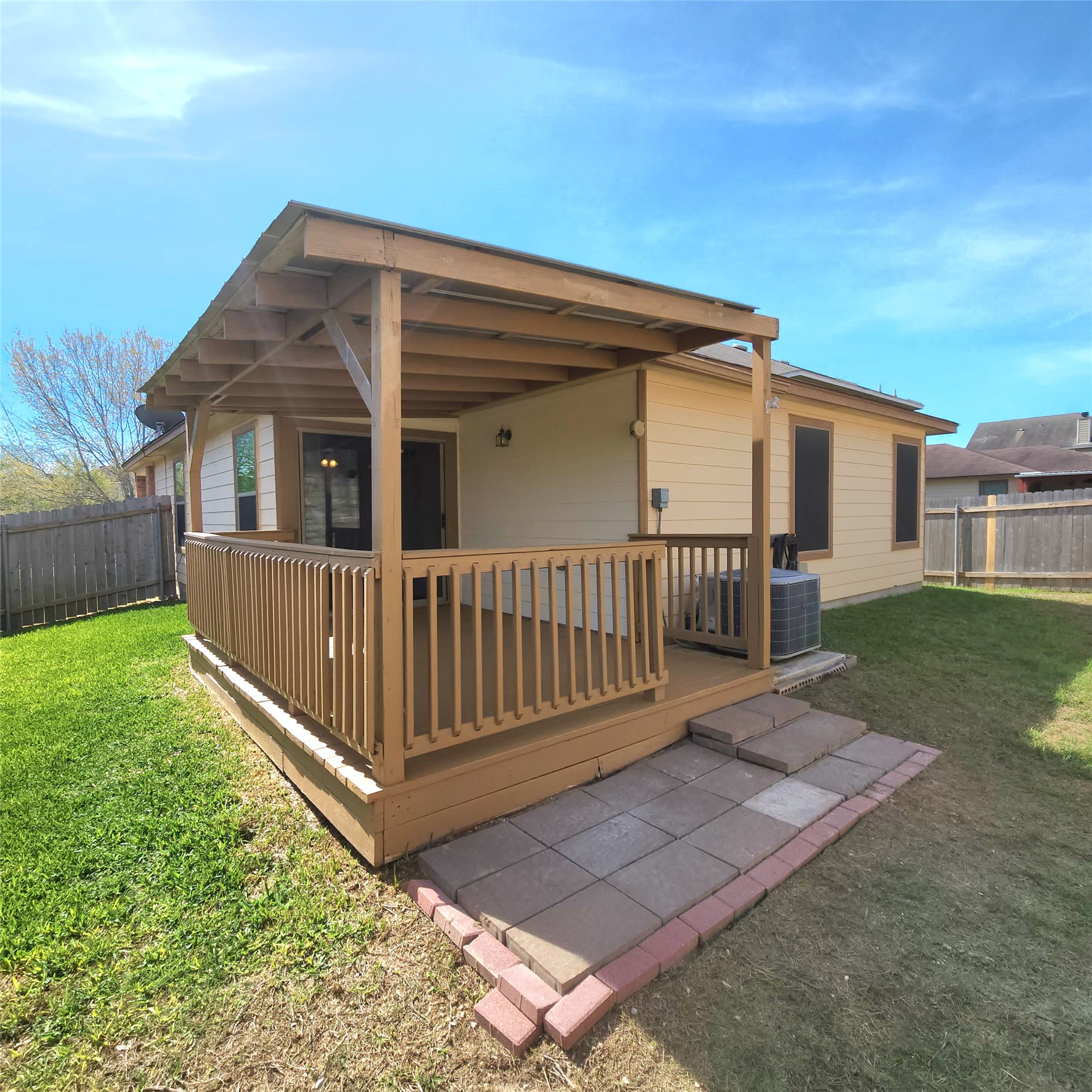 273 Tower Drive Kyle, TX 78640 - Photo 13 of 13 a view of a house with a yard and deck