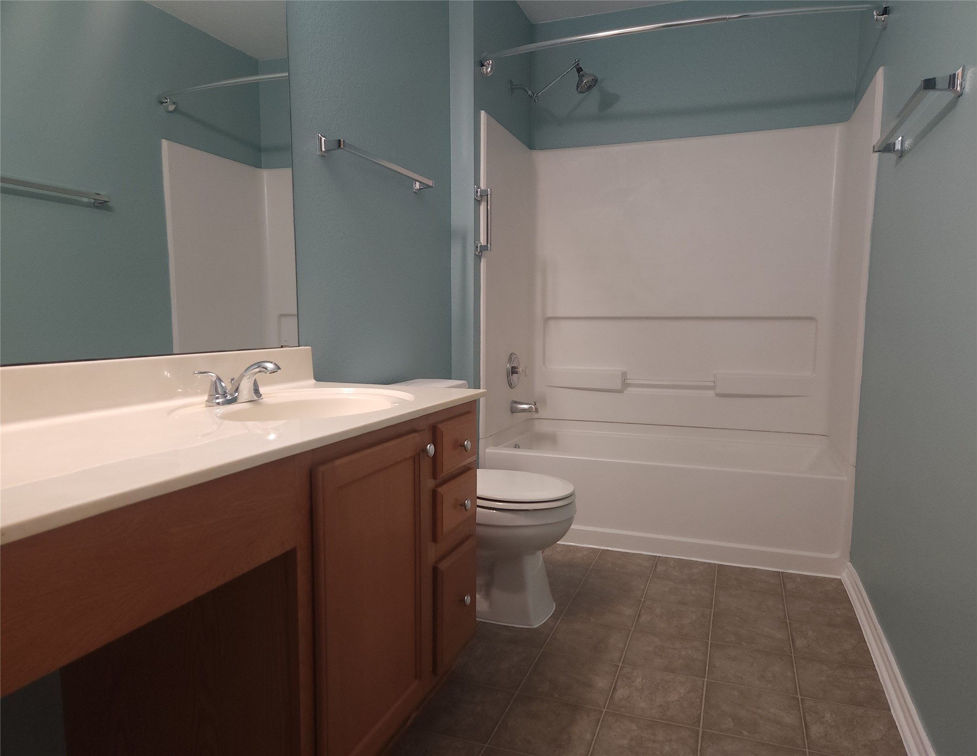 273 Tower Drive Kyle, TX 78640 - Photo 9 of 13 a bathroom with a sink a toilet and shower