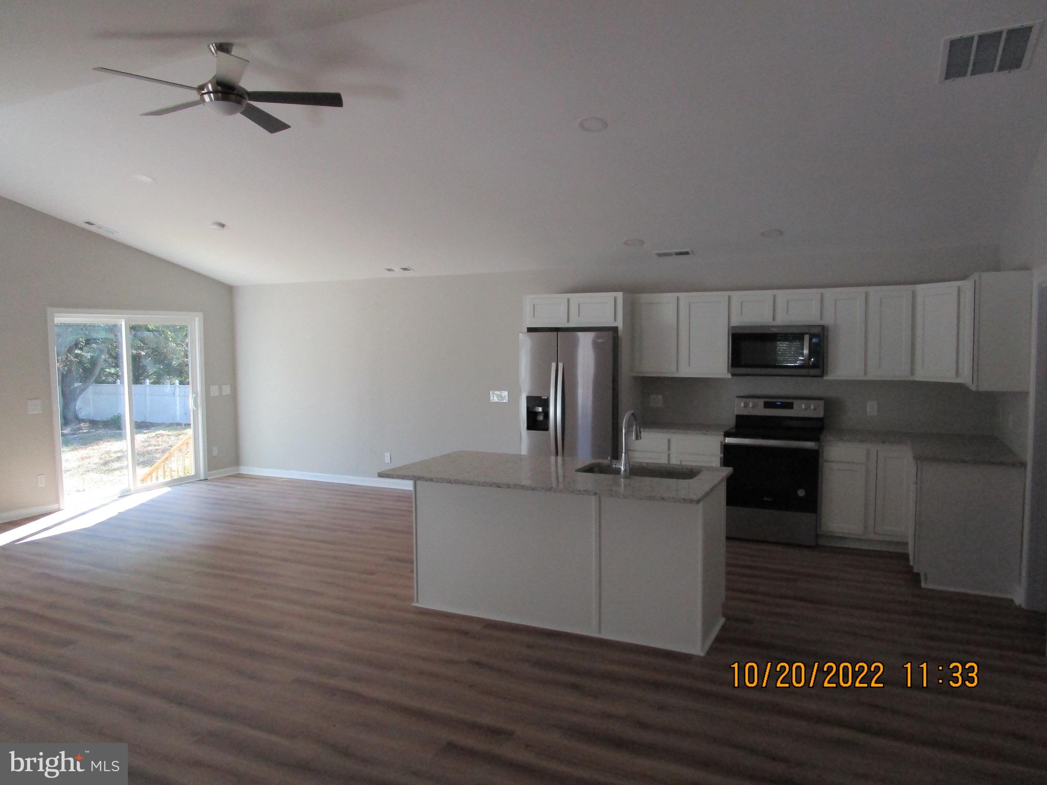 20187 Beaver Dam Road Lewes, DE 19958 - Photo 10 of 16 Kitchen/Dining/Gathering Area