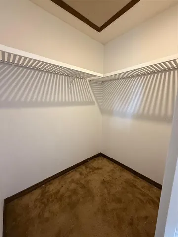 a view of small space with racks on the wall