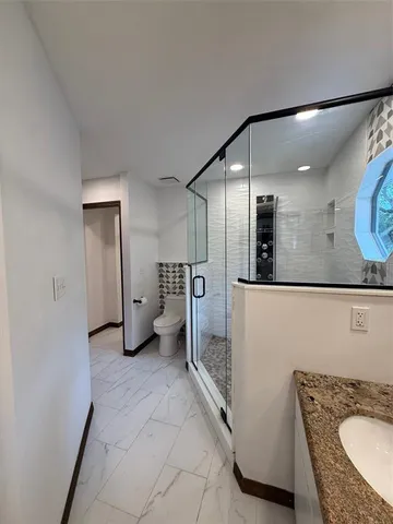 an empty room with a empty space and a window