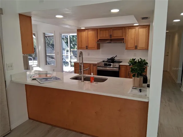 a close view of a sink and a mirror