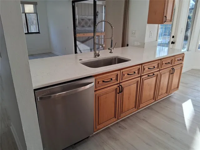 a kitchen with a stove and a microwave
