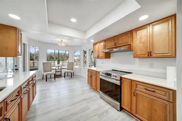 a room with a closet and wooden shelves