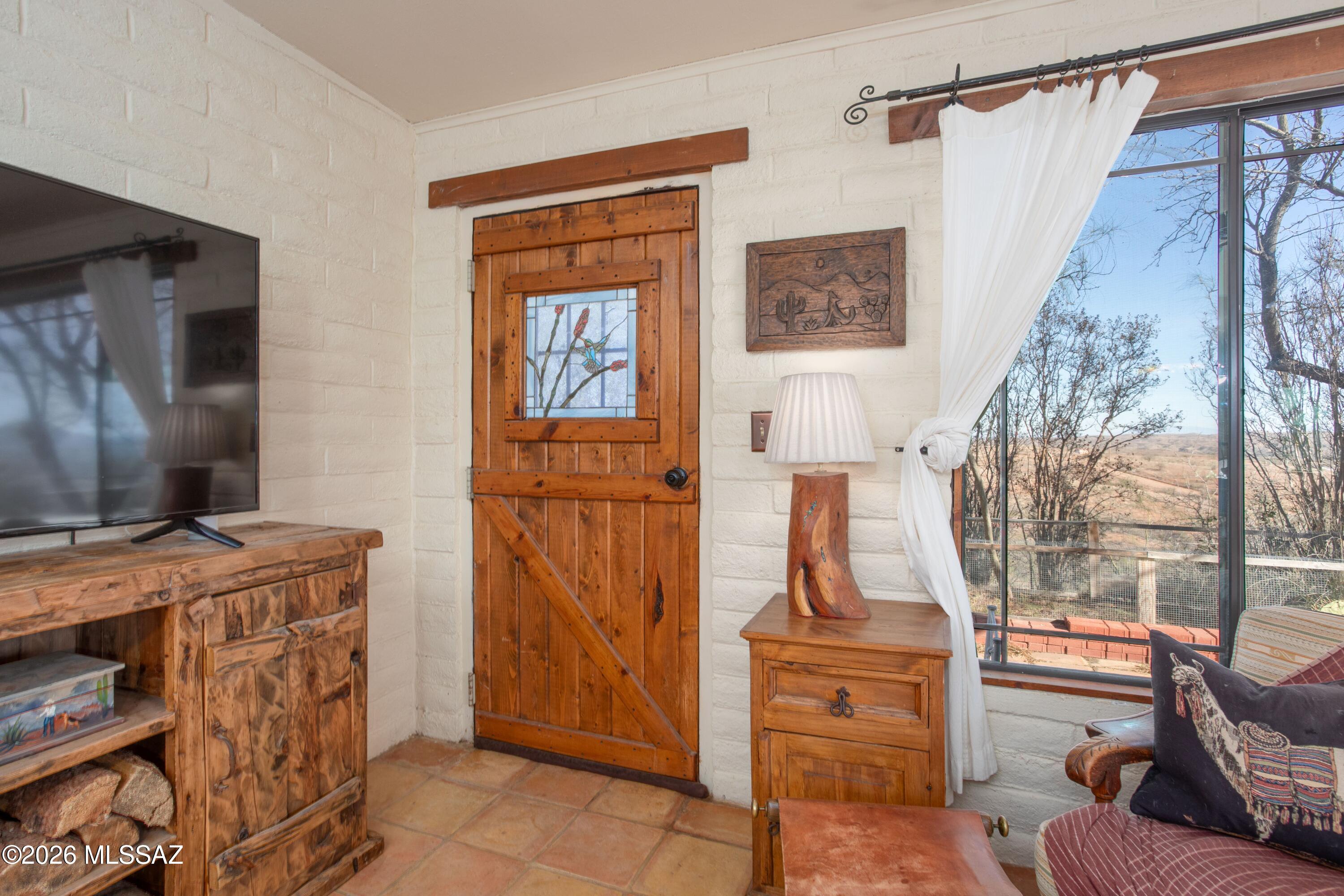 13520 West Universal Ranch Road Arivaca, AZ 85601 - Photo 15 of 48 front door to living area