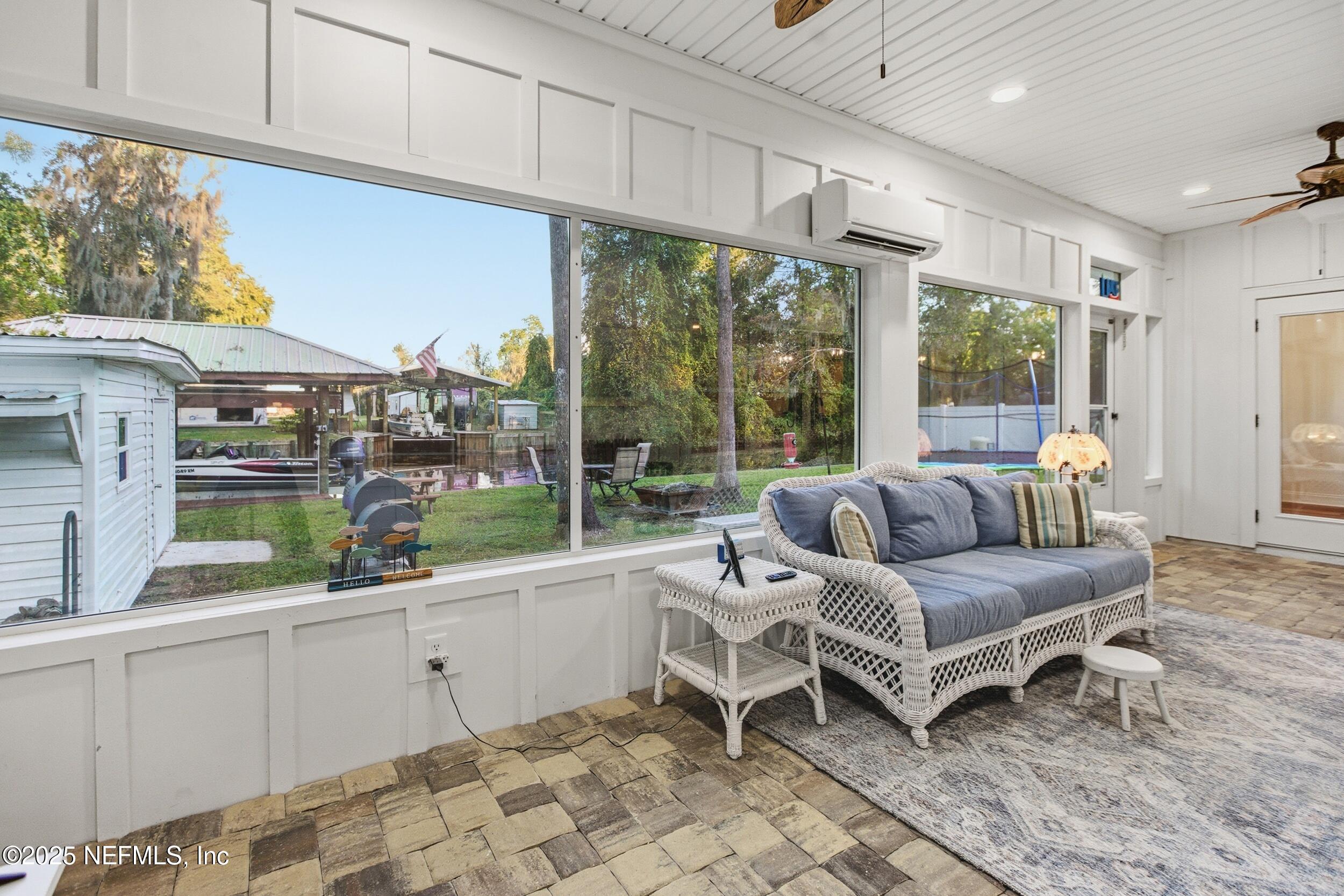 128 Santa Rosa Street Florahome, FL 32140 - Photo 36 of 57 Back Enclosed Porch 1